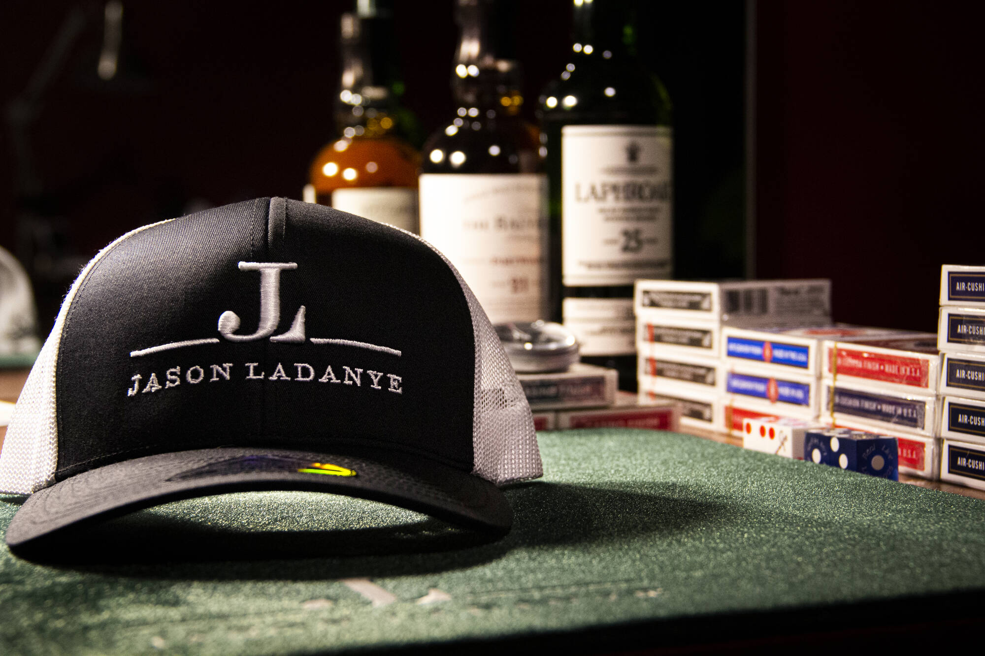 Hat with Jason Ladanye Logo